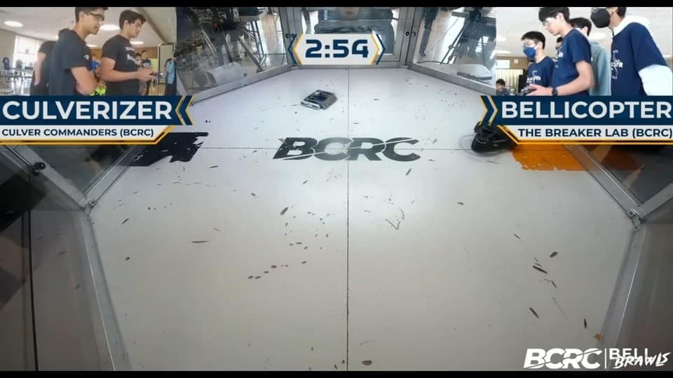 Tournament overlay from the match footage: Culverizer of the Culver Commanders against Bellicopter of The Breaker Lab, with a 2:54 clock over an empty arena floor scattered with debris.