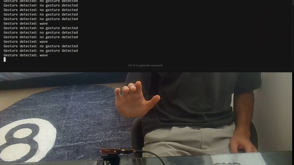 Split screen: a terminal printing 'Gesture detected: wave' among lines reading 'no gesture detected', above a hand waving in front of the radar board.